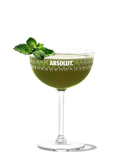 lime matcha cocktail against white background