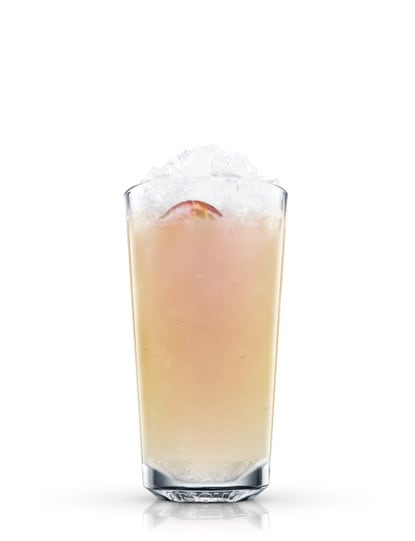 passionfruit collins against white background