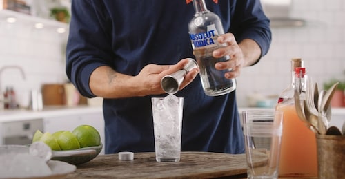 Measure and Add Absolut Vodka.